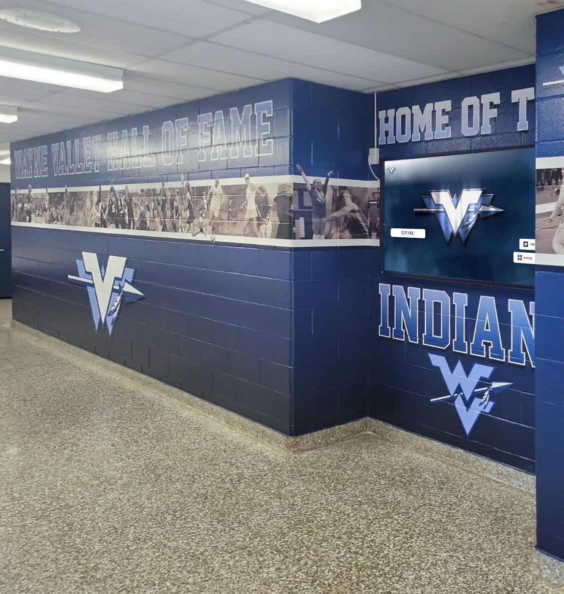 School hallway with comprehensive recognition wall installation
